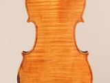 an old violin with a wooden back and a long neck