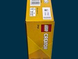 a yellow box that is sitting on top of a table