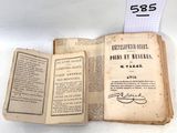 deux vieux livres posés sur une table, avec une étiquette de prix