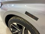 a close up of a car with a sticker on the side of it