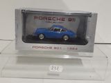 a close up of a toy car in a clear display case