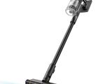 a close up of a cordless vacuum cleaner on a white background