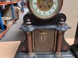 a clock that is sitting on top of a table