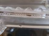 a clear glass plate with a white flower on it