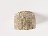 a close up of a ring on a white surface with a white background