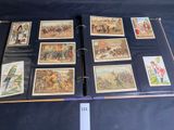 a lot of pictures on a binder on a table