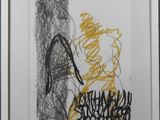 an image of a black and yellow drawing on a white paper
