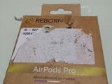 a box of airpods on a table with a sticker on it