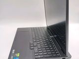 a laptop that is sitting on a white table