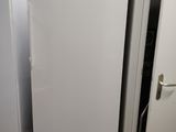 a white refrigerator and a white refrigerator freezer in a kitchen