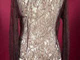 a woman ' s jacket on a mannequin mannequin mannequin mannequin mannequin mannequin mannequin mannequin mann