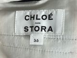 a close up of a label on a white jacket