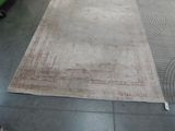 a large rug on the floor in a room