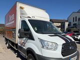 a delivery truck that is parked in a parking lot
