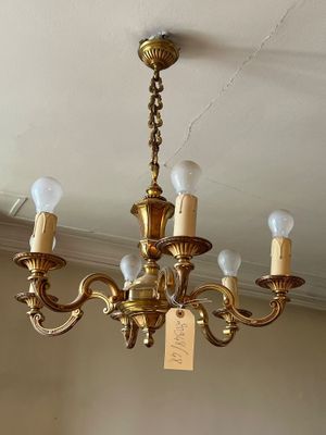 a chandelier that has a price tag on it