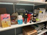 many items on the shelves in the pantry