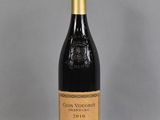 a bottle of wine that is sitting on a table