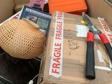 a cardboard box filled with assorted items for sale