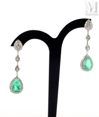 an image of a pair of emerald and diamond earrings