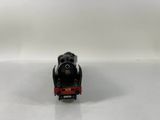 a toy train that is sitting on a white surface