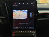 a picture of a car dashboard with a camera on it