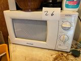 a microwave that is sitting on top of a counter