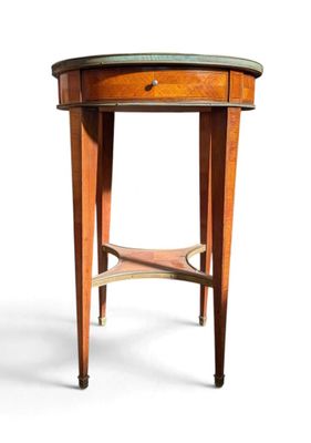 a small wooden table with a drawer on top of it