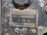 a close up of an old machine with some rust on it
