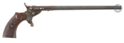 un gros plan d'un pistolet sur un fond blanc avec un fond blanc