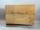 une image représentant une boîte en bois sur laquelle est accrochée une pancarte portant l'inscription « Haut-Baily II »