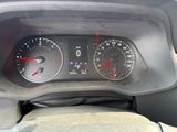 a close up of a car dashboard with a speedometer and gauges