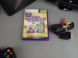 a video game on a table next to a game controller