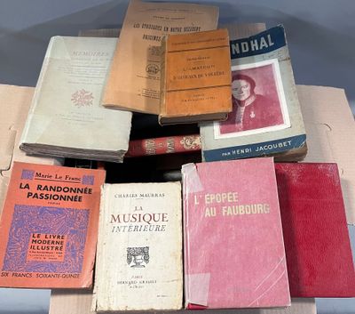 a lot of books that are sitting on a table