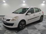 a picture of a white car parked in a garage