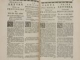 an open book with a black and white image of a man ' s face