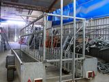a large metal structure in the middle of a building