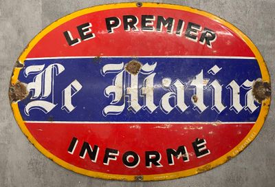 panneau accroché au mur d'une station-service française en France