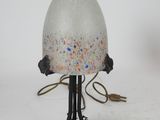 a lamp that is sitting on top of a table