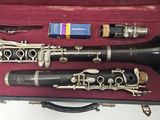three clarinets in a case on a table