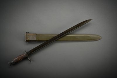 a knife and a lighter on a table