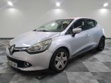 a white car is parked in a room with a checkered floor