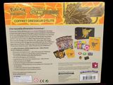 the back of a box with a game on it and a card in it