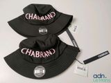 two black bucketers with pink letters on them sitting on top of a table