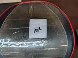 a sticker on the back of a chair with a note attached to it