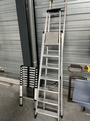 a ladder that is leaning against a wall in a garage