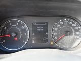 a close up of a speedometer and gauges in a car