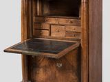 an old wooden desk with drawers and a drawer underneath it