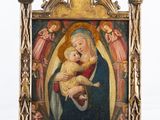 une image représentant un tableau de la Vierge à l'Enfant posé sur un socle