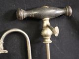 a faucet and a faucet on a black background