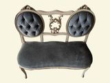 an image of a chair with a blue upholstered seat